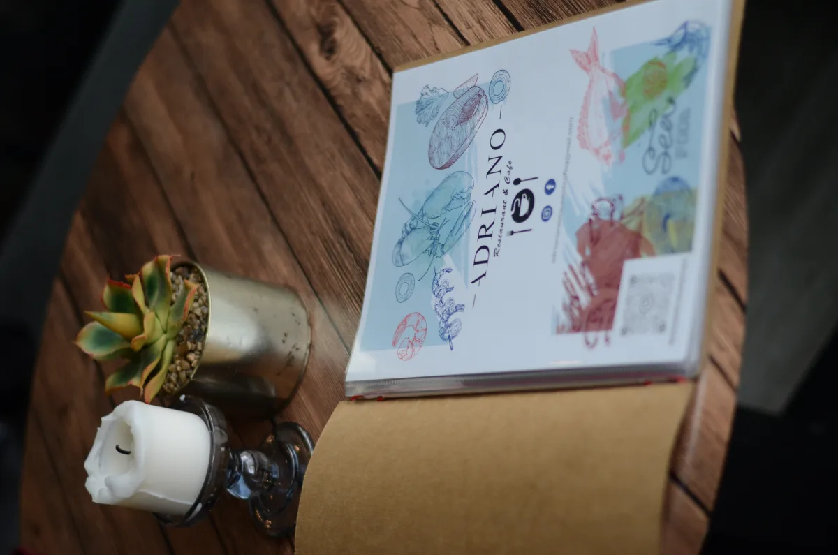 Adriano Restaurant — menu design on table